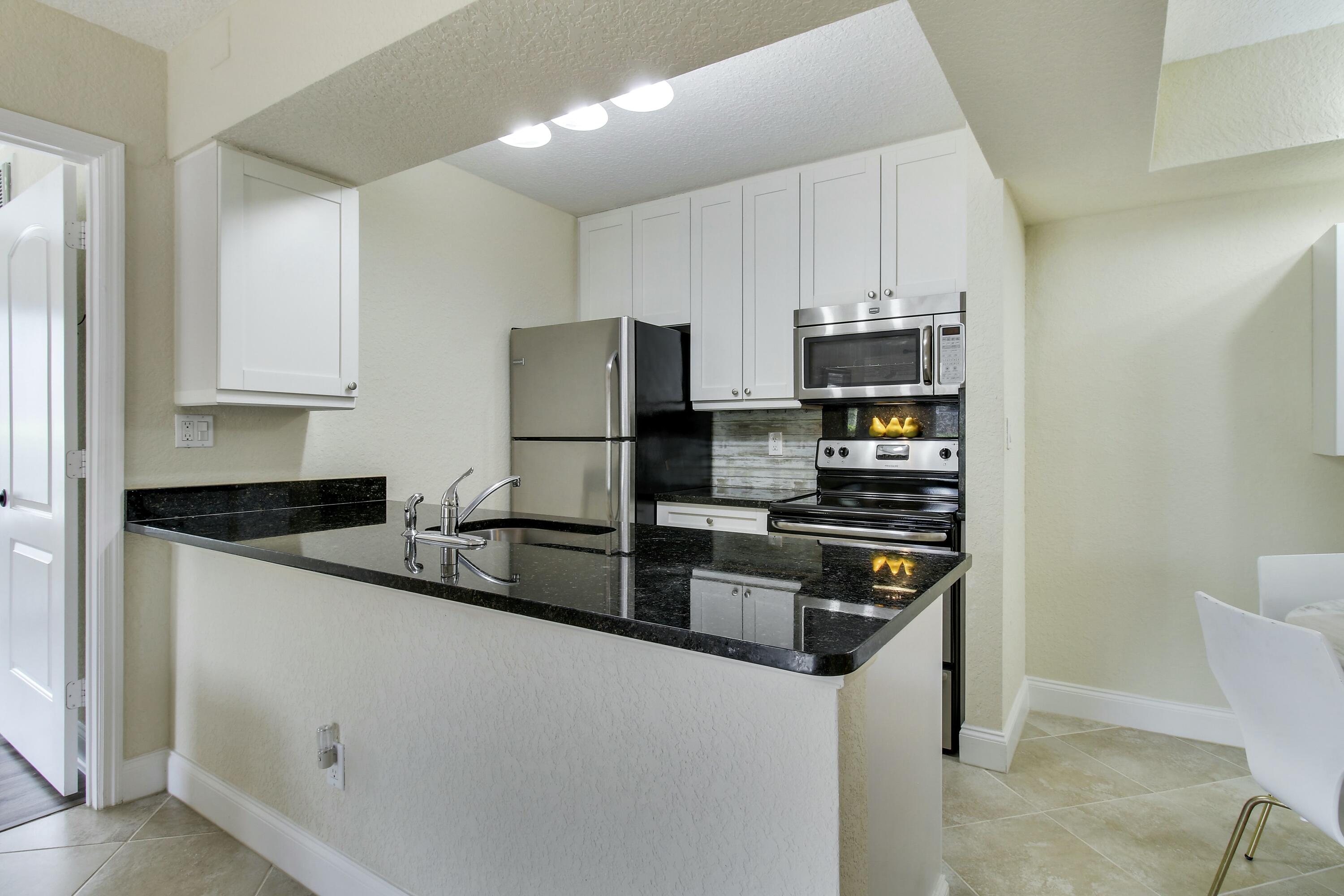 6285 Chasewood Drive, Unit A Jupiter, FL 33458 - Photo 10 of 29 tempImageokSvVM