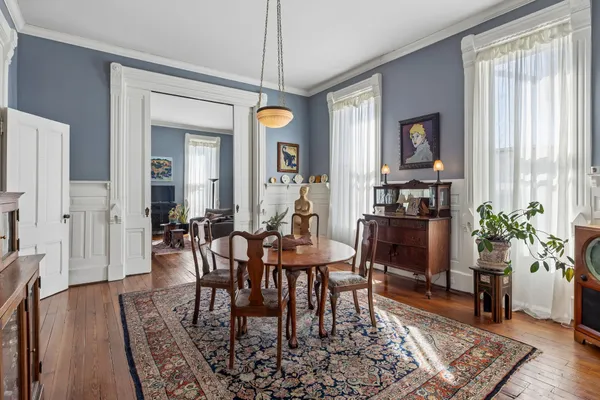 a kitchen with granite countertop a sink appliances a counter space and cabinets