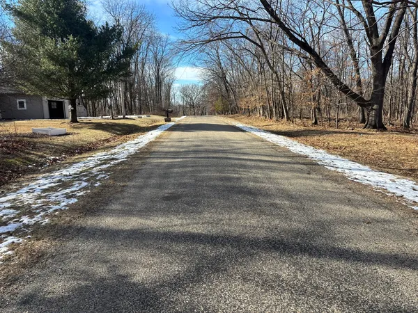 a view of road with yard