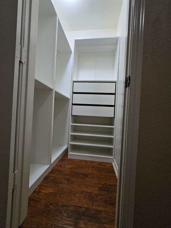 4664 Cherokee Path Carrollton, TX 75010 - Photo 18 of 21 a view of walk in closet