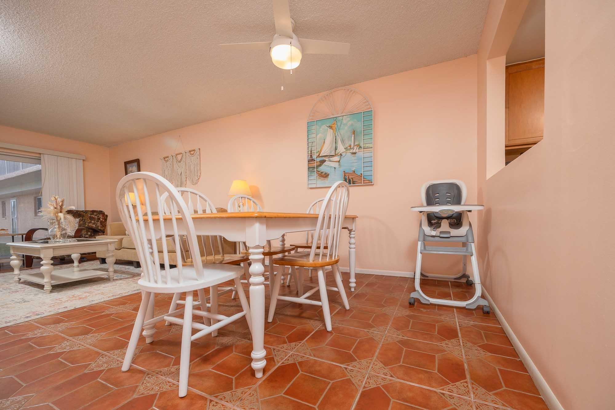 4 Ocean Trace Road, Unit 122 St. Augustine, FL 32080 - Photo 14 of 47 a dining room with furniture and view of kitchen