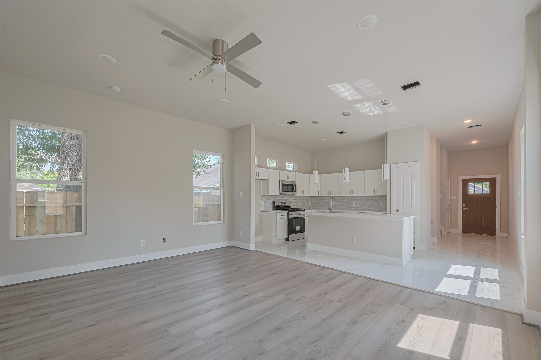 7207 Force Street Houston, TX 77020 - Photo 3 of 29 Bright and spacious open-concept living area with modern finishes.