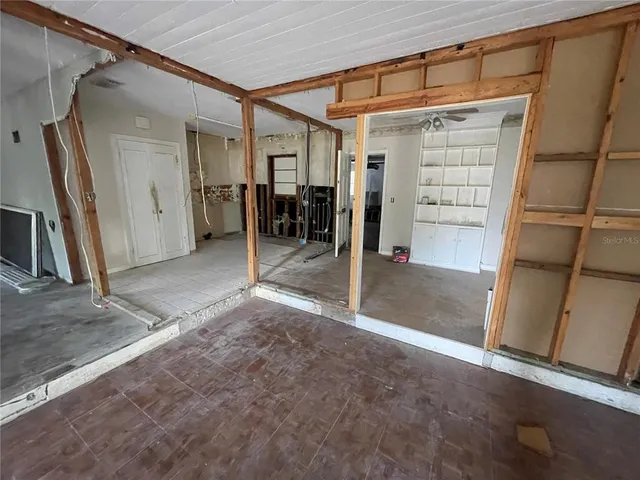 an empty room with windows