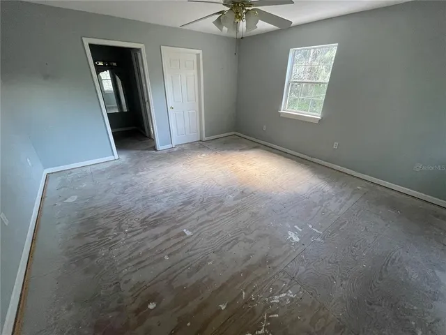 an empty room with windows