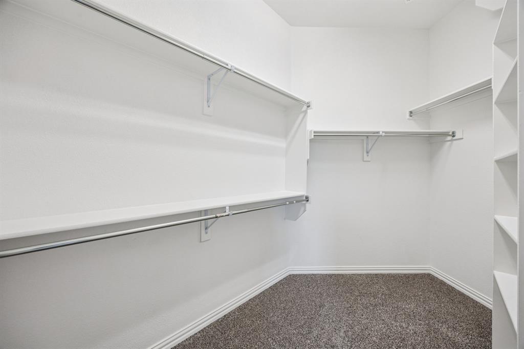 7205 Joshua Tree Trail McKinney, TX 75070 - Photo 21 of 32 a view of an empty walk in closet