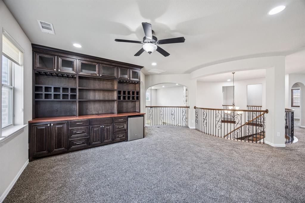 7205 Joshua Tree Trail McKinney, TX 75070 - Photo 23 of 32 a view of a kitchen with furniture and a window