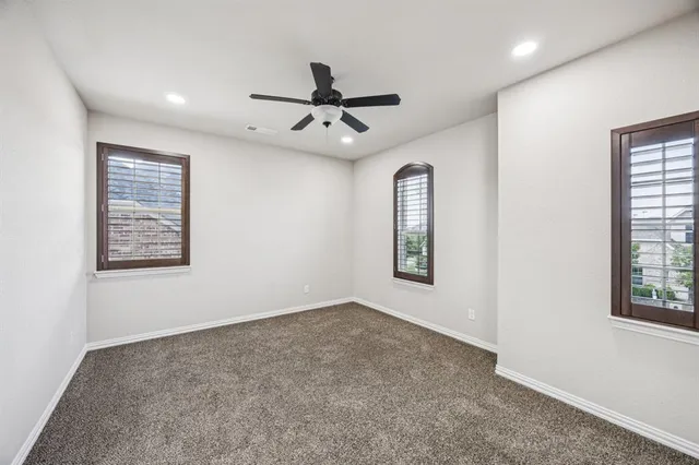 a view of a hallway with closet area
