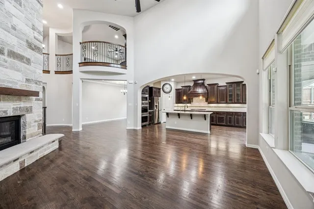 a view of a livingroom with furniture and a kitchen