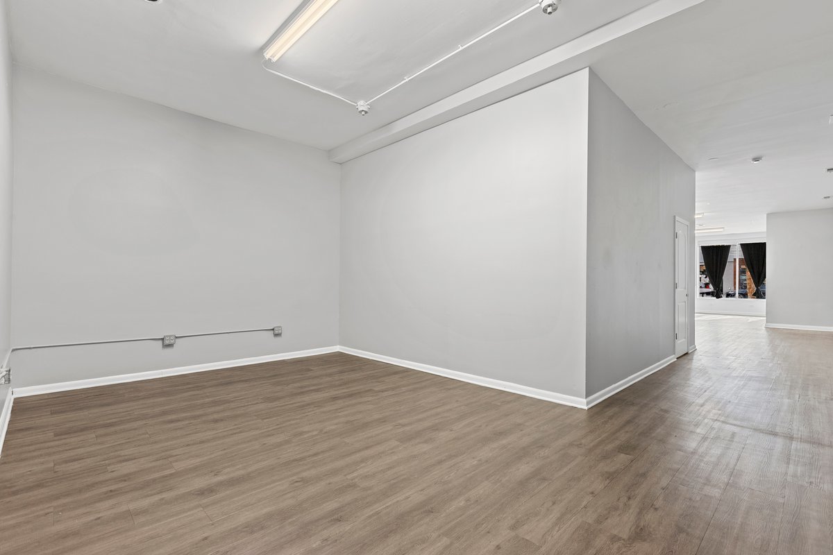 2708 West Division Street Chicago, IL 60622 - Photo 4 of 15 a view of an empty room with wooden floor