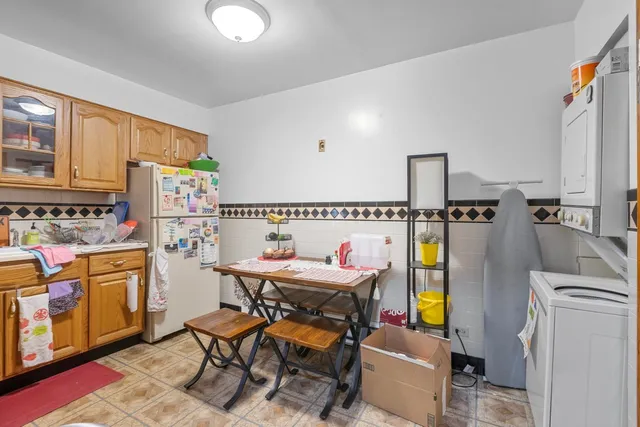 a dining room with furniture and natural light