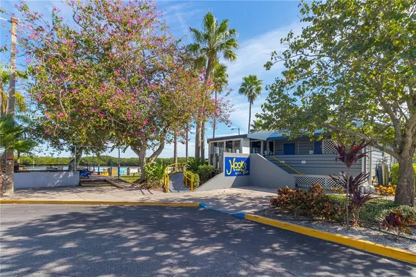 a view of an apartment with a swimming pool