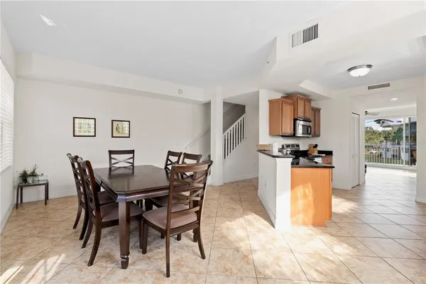 a kitchen with sink cabinets and appliances