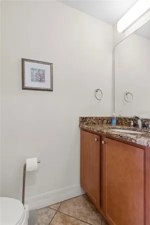 a view of a chairs and table in the balcony