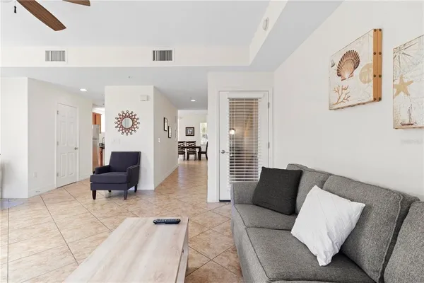 a living room with furniture and a rug