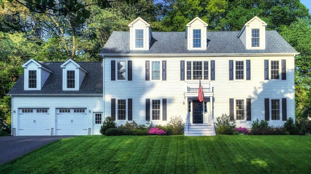 3 Ballard Terrace Lexington, MA 02420 - Photo 1 of 24 a front view of a house with a garden