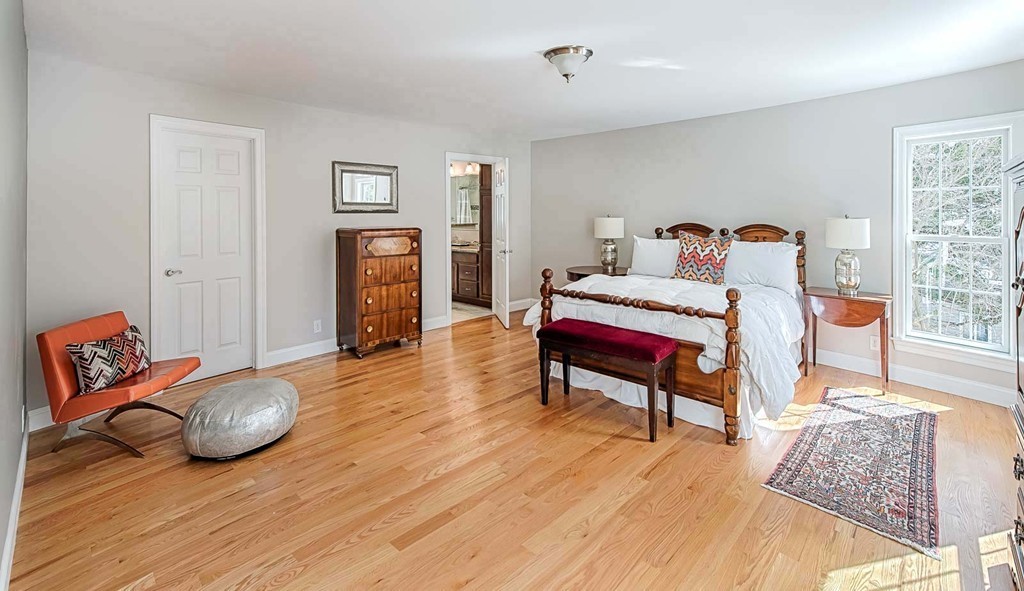 3 Ballard Terrace Lexington, MA 02420 - Photo 20 of 24 a bedroom with furniture and a wooden floor