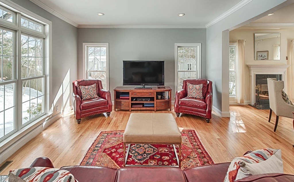 3 Ballard Terrace Lexington, MA 02420 - Photo 7 of 24 a living room with furniture and a flat screen tv