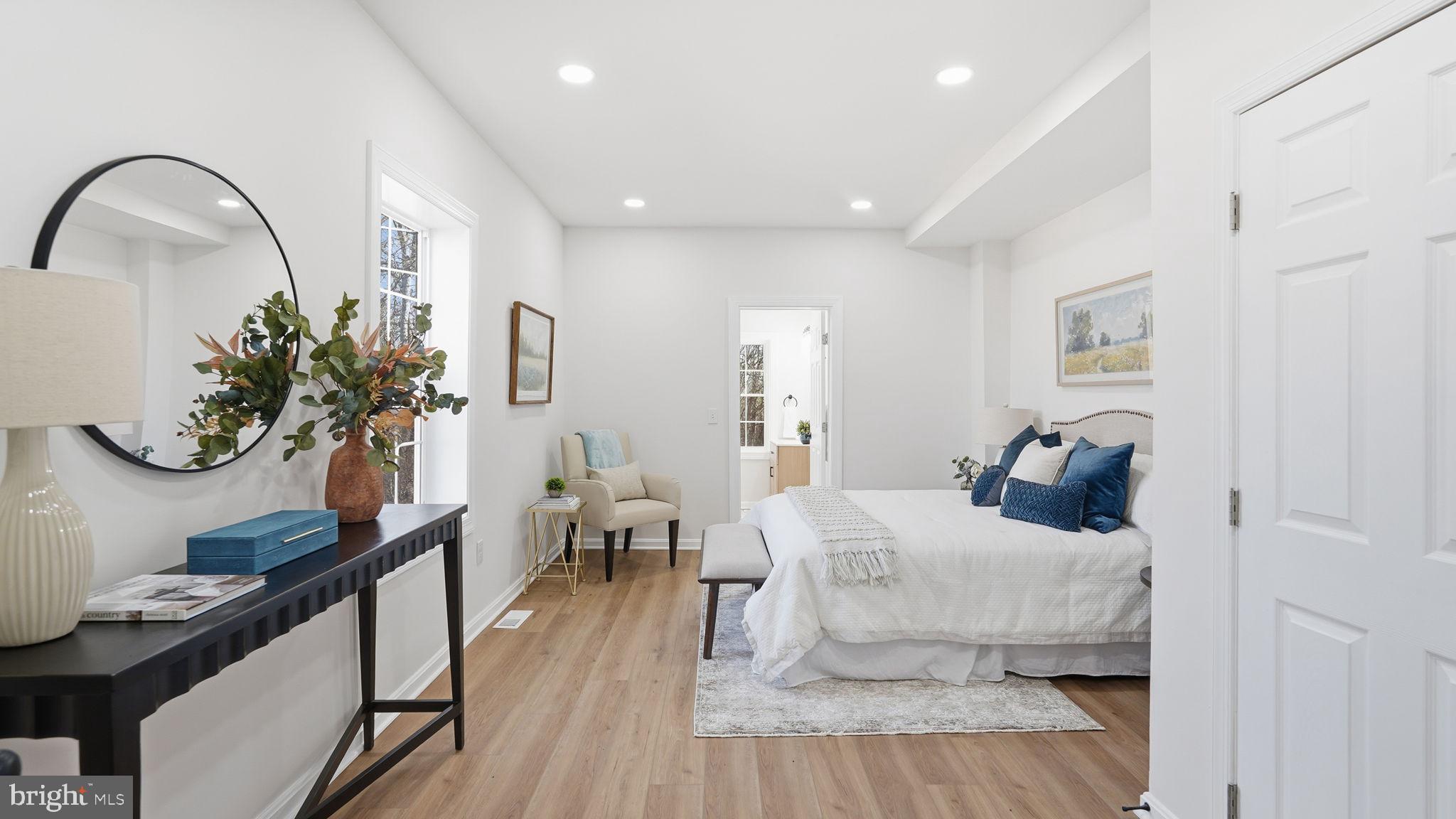 12219 River Road Remington, VA 22734 - Photo 12 of 31 a bedroom with furniture and wooden floor