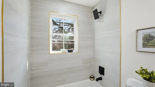 a bathroom with a bathtub