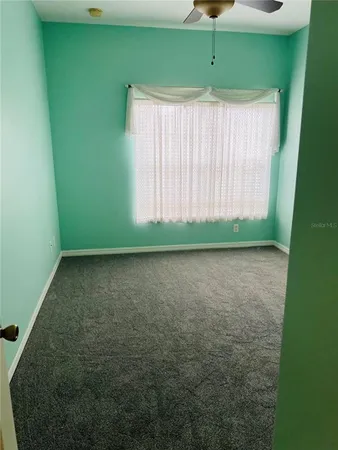a view of a room with a window