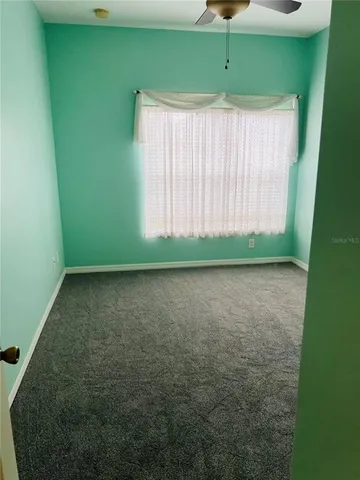 a view of a room with a window