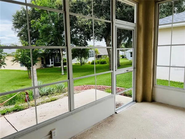 a view of a room with porch and a patio