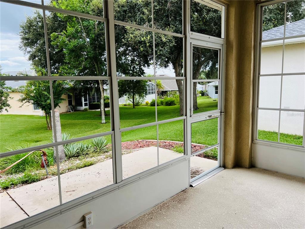 5446 Sea Leopard Street Tavares, FL 32778 - Photo 20 of 39 a view of a room with porch and a patio
