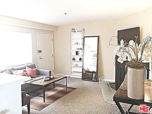 a bathroom with a table and a sink