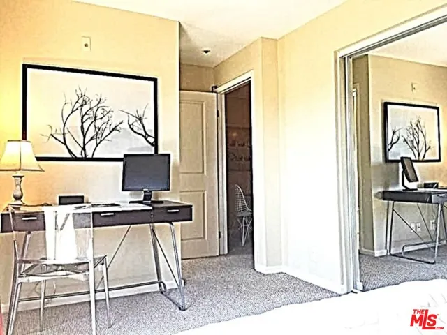a kitchen with stainless steel appliances a refrigerator sink and cabinets