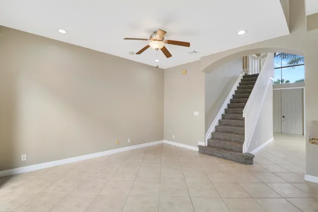 an entryway in a hall with a window