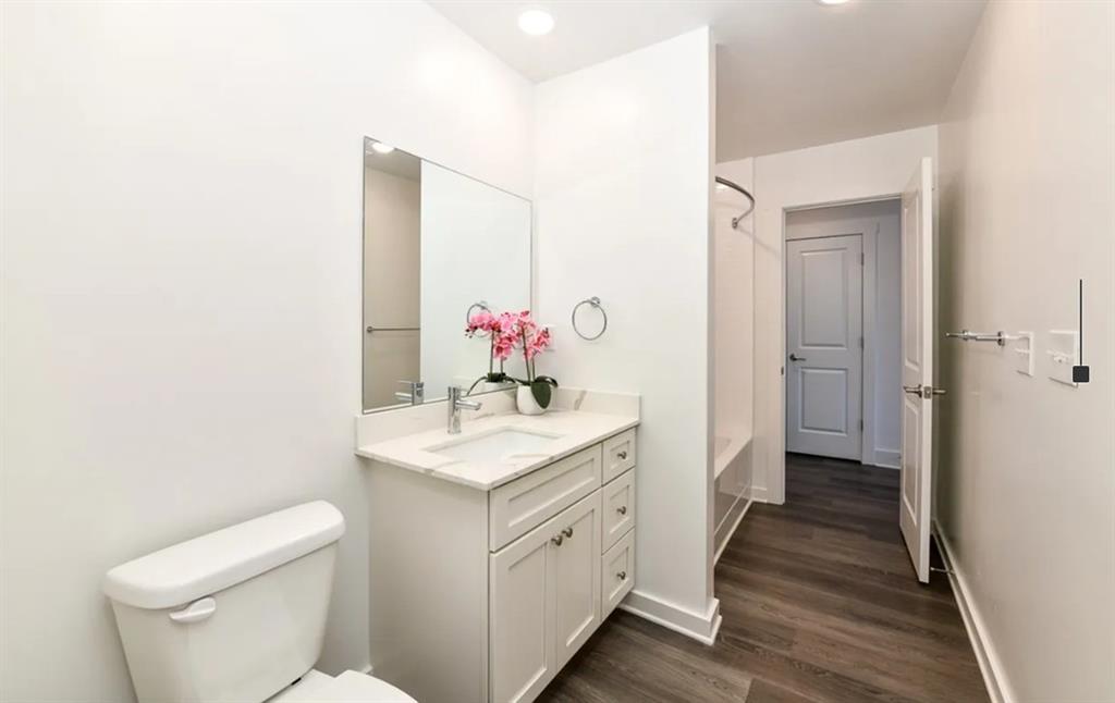 5055 Southwood Road, Unit 2103 Union City, GA 30213 - Photo 12 of 24 a spacious bathroom with a sink and a mirror