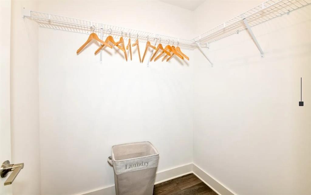 5055 Southwood Road, Unit 2103 Union City, GA 30213 - Photo 14 of 24 a bathroom with a toilet and a shower curtain