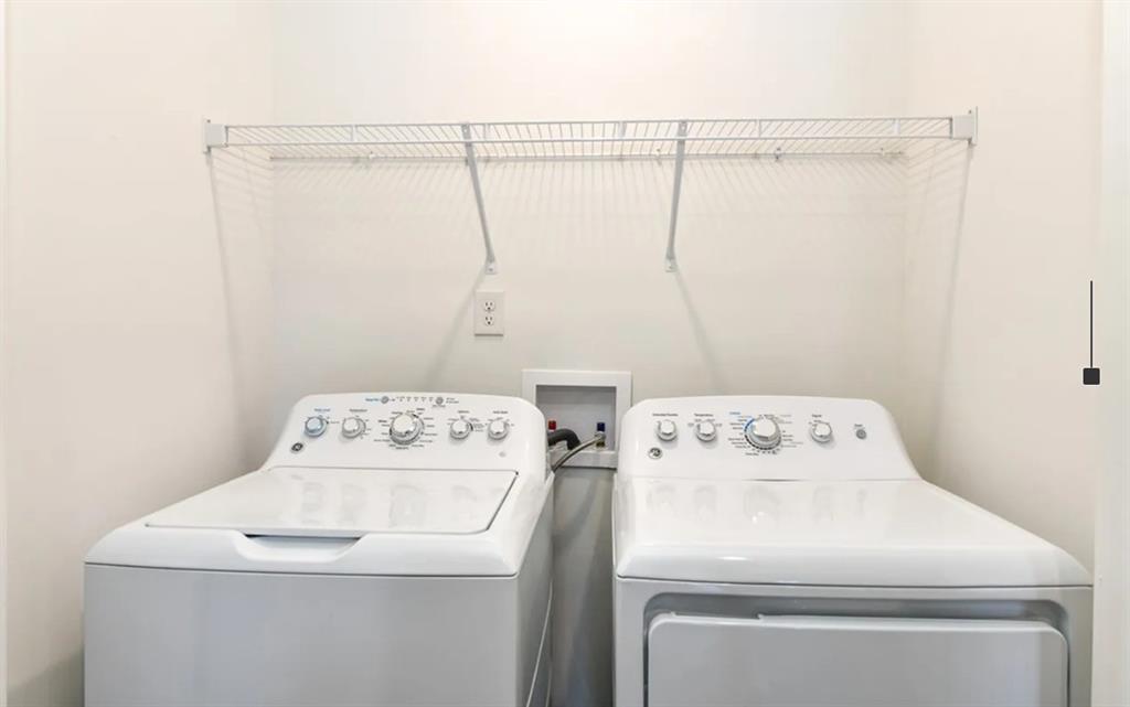 5055 Southwood Road, Unit 2103 Union City, GA 30213 - Photo 15 of 24 a utility room with dryer and washer