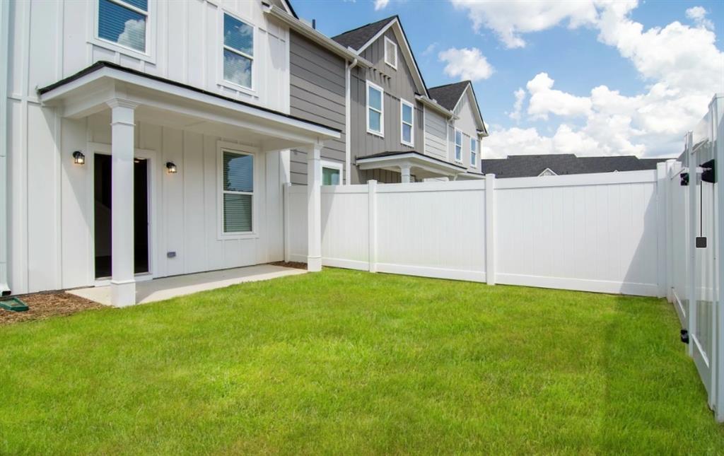 5055 Southwood Road, Unit 2103 Union City, GA 30213 - Photo 16 of 24 front view of a house with a yard