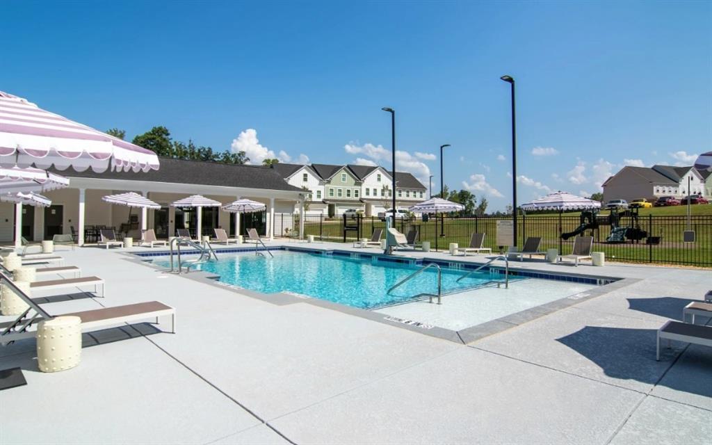 5055 Southwood Road, Unit 2103 Union City, GA 30213 - Photo 21 of 24 a view of house with swimming pool and sitting area
