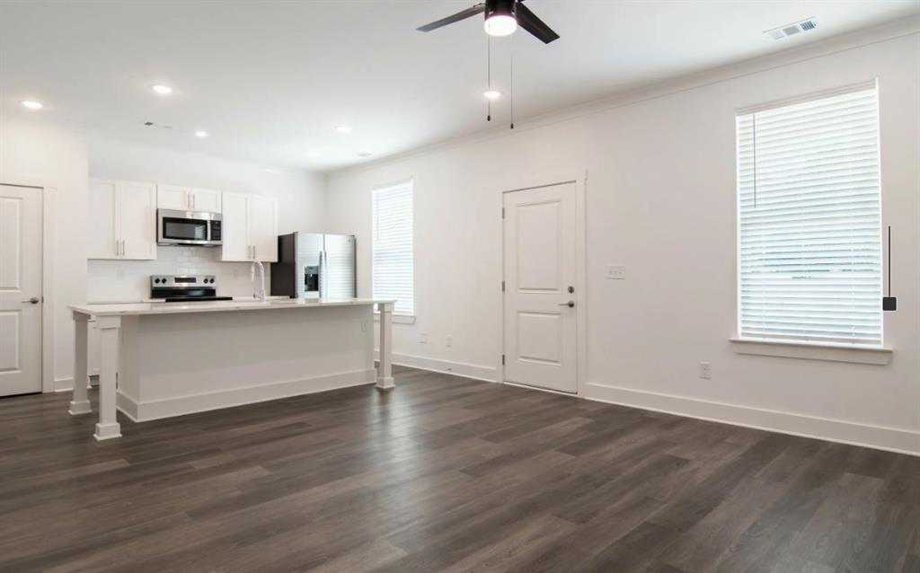 5055 Southwood Road, Unit 2103 Union City, GA 30213 - Photo 3 of 24 a view of kitchen with sink microwave and cabinets