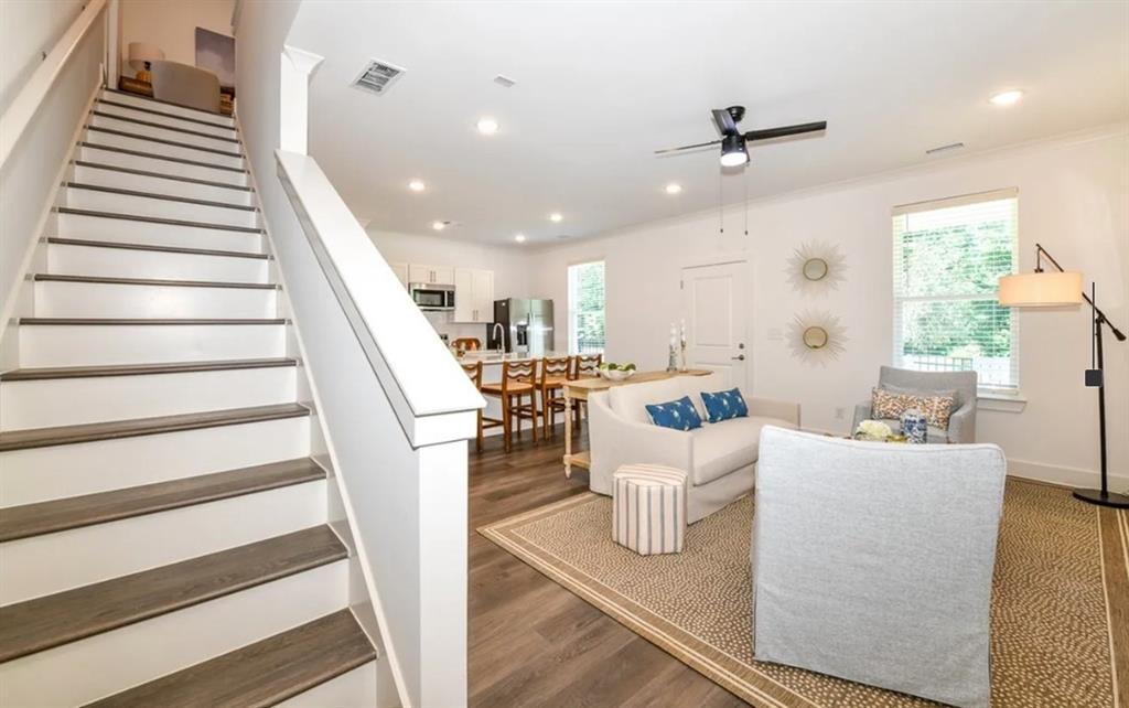 5055 Southwood Road, Unit 2103 Union City, GA 30213 - Photo 4 of 24 a living room with furniture and a wooden floor