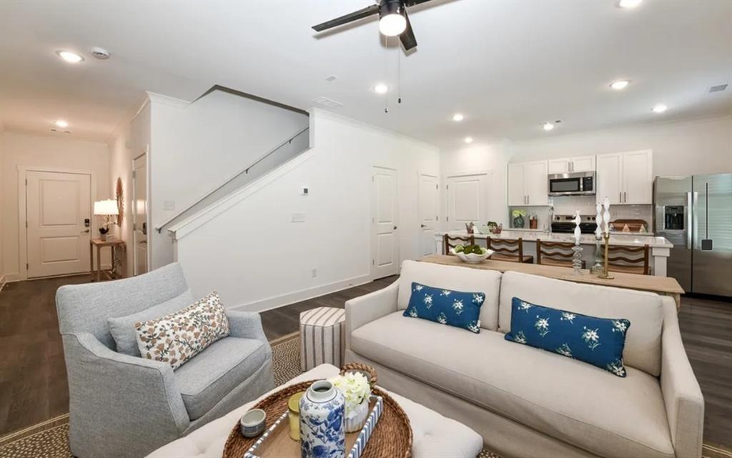 5055 Southwood Road, Unit 2103 Union City, GA 30213 - Photo 5 of 24 a living room with furniture and kitchen view