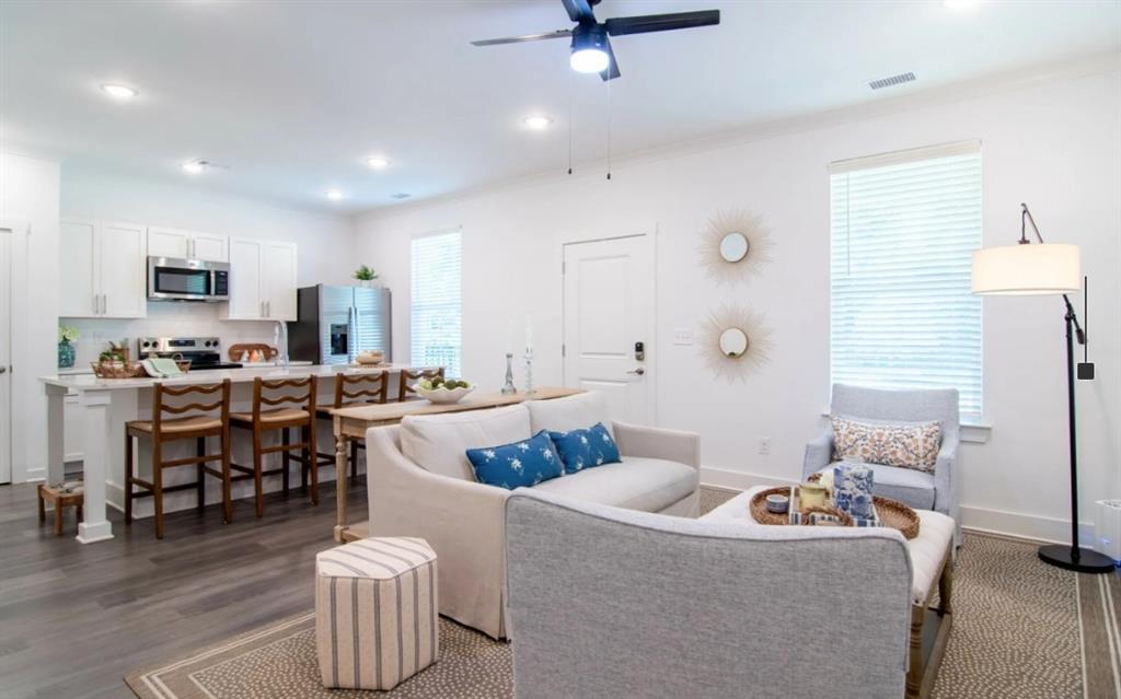 5055 Southwood Road, Unit 2103 Union City, GA 30213 - Photo 6 of 24 a living room with furniture and kitchen view