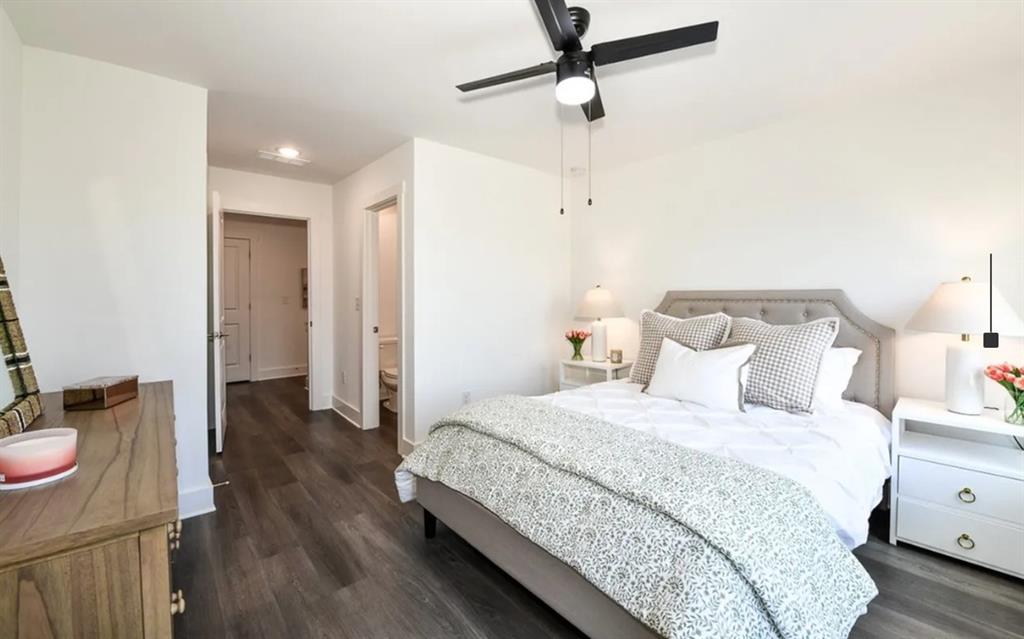 5055 Southwood Road, Unit 2103 Union City, GA 30213 - Photo 7 of 24 a bedroom with a bed and wooden floor