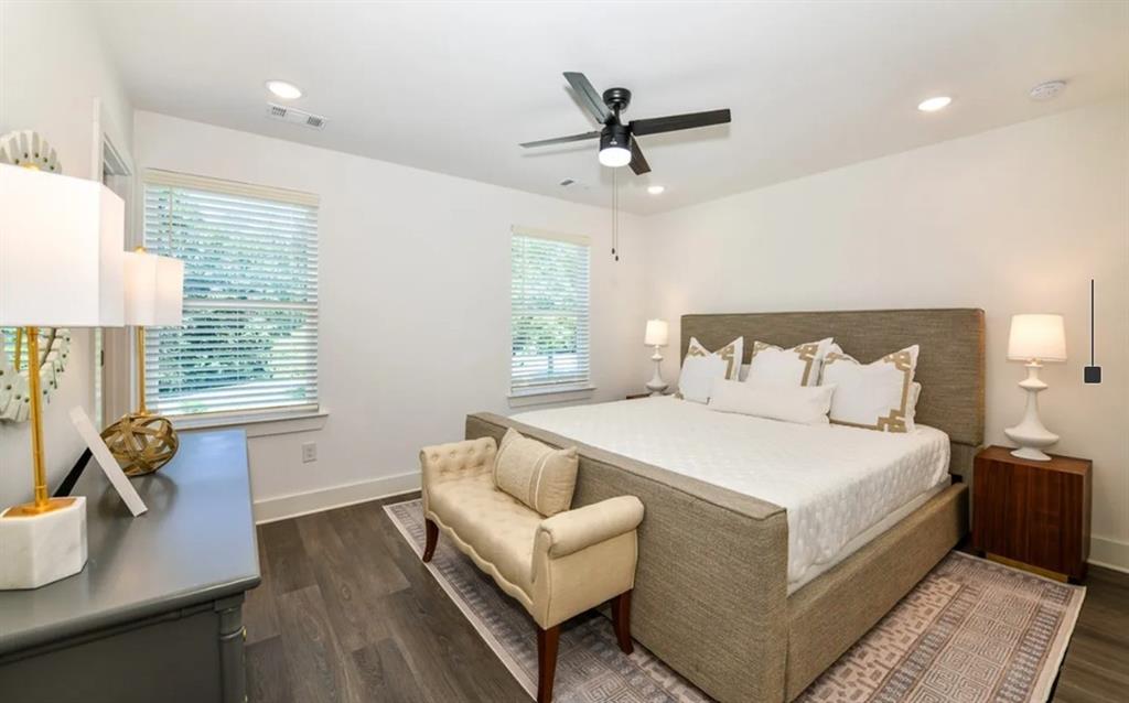 5055 Southwood Road, Unit 2103 Union City, GA 30213 - Photo 9 of 24 a bedroom with a bed a couch and a window