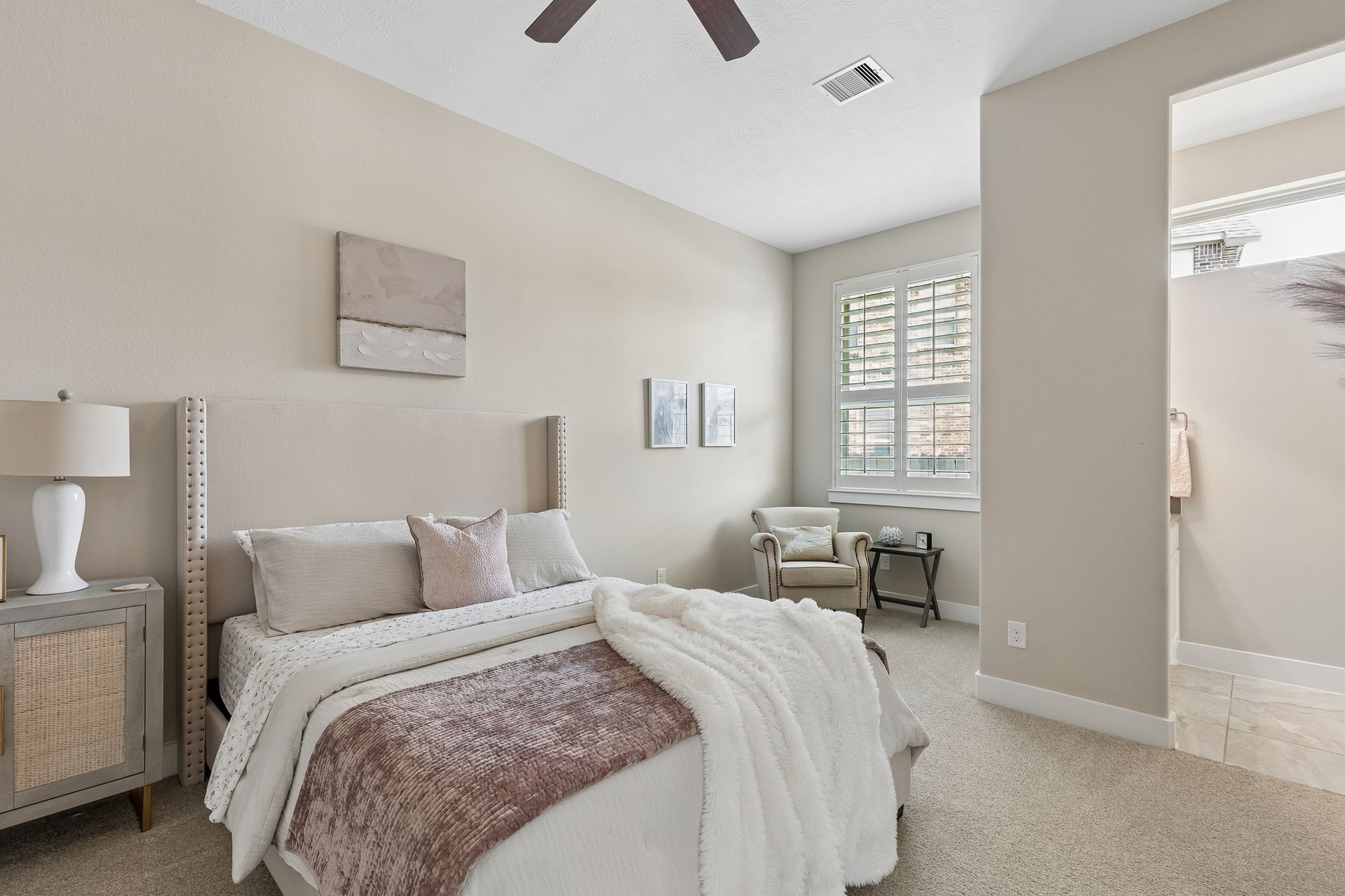 6514 Woodleaf Lake Loop Katy, TX 77493 - Photo 19 of 32 The fourth bedroom offers a generous and inviting space that is perfect if you're looking for comfort and versatility.