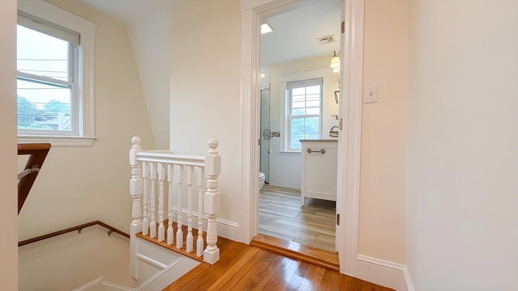 114 Curve Street Dedham, MA 02026 - Photo 18 of 27 a view of entryway with wooden floor