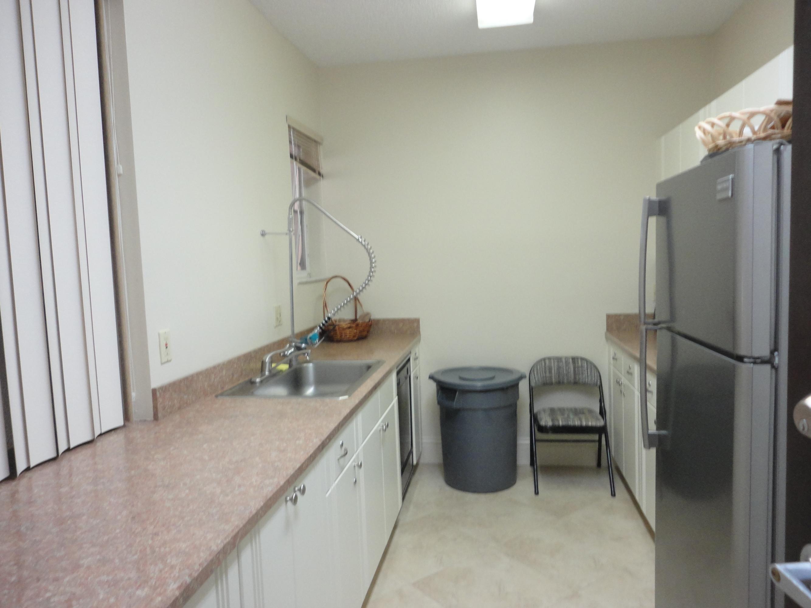 8278 Springlake Drive, Unit E Boca Raton, FL 33496 - Photo 25 of 35 Clubhouse Kitchen