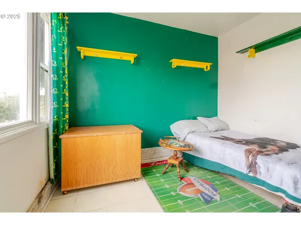 a room with two chairs and a table