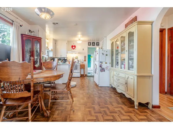 a view of a dining room with furniture