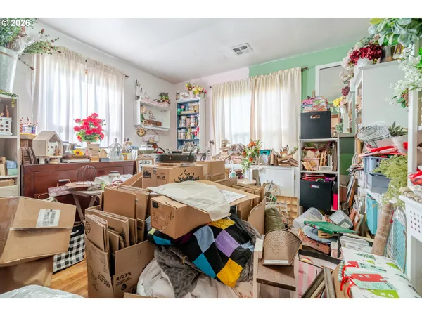 a very nice looking living room with furniture and a floor to ceiling window
