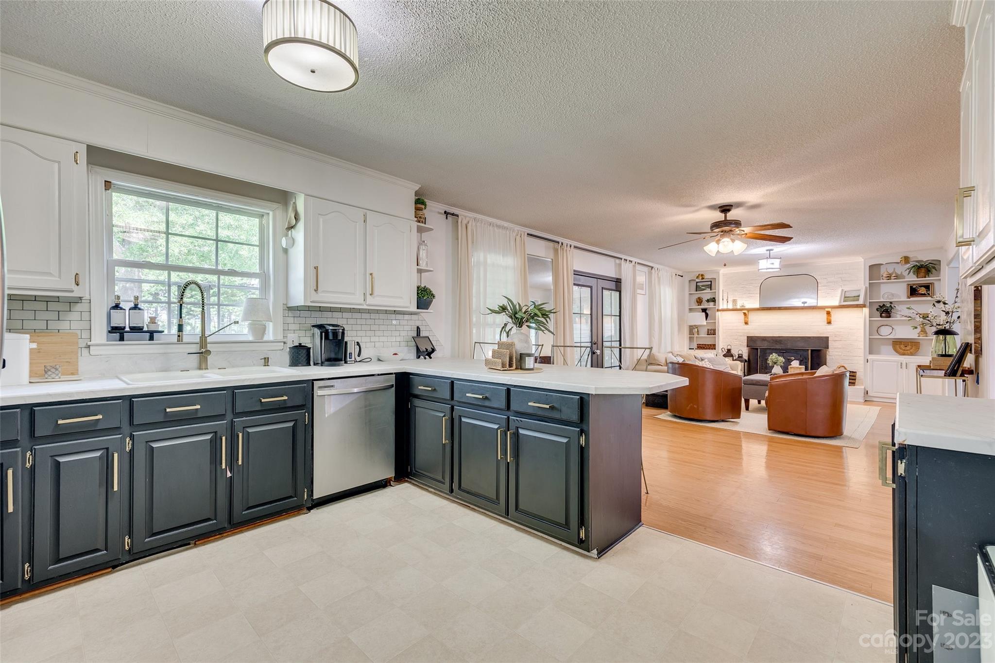 377 Rainbow Circle Clover, SC 29710 - Photo 14 of 29 a kitchen with sink and cabinets
