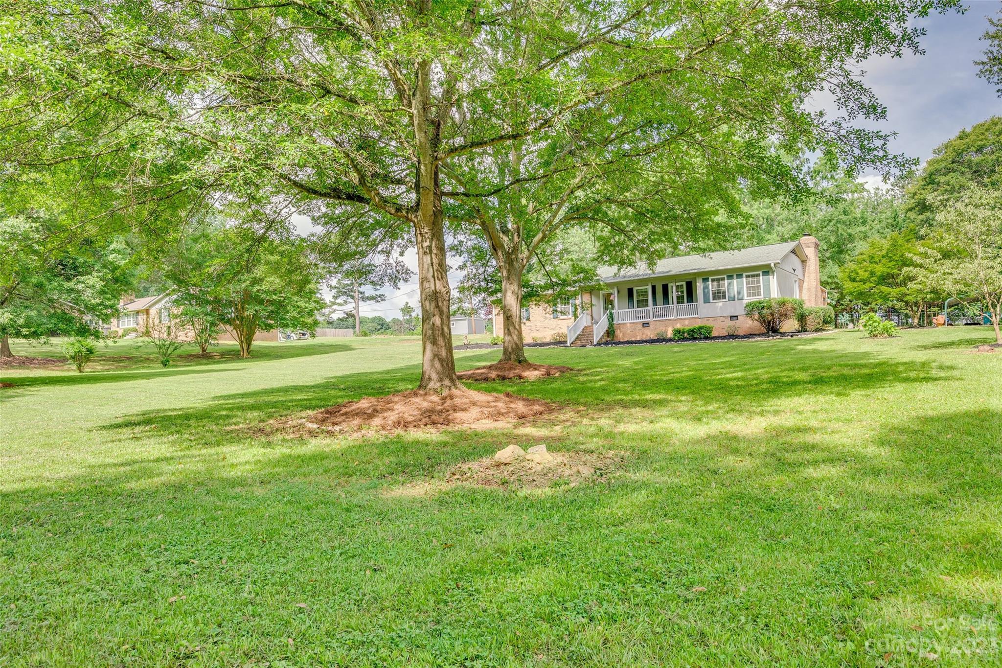 377 Rainbow Circle Clover, SC 29710 - Photo 3 of 29 a view of a house with a big yard