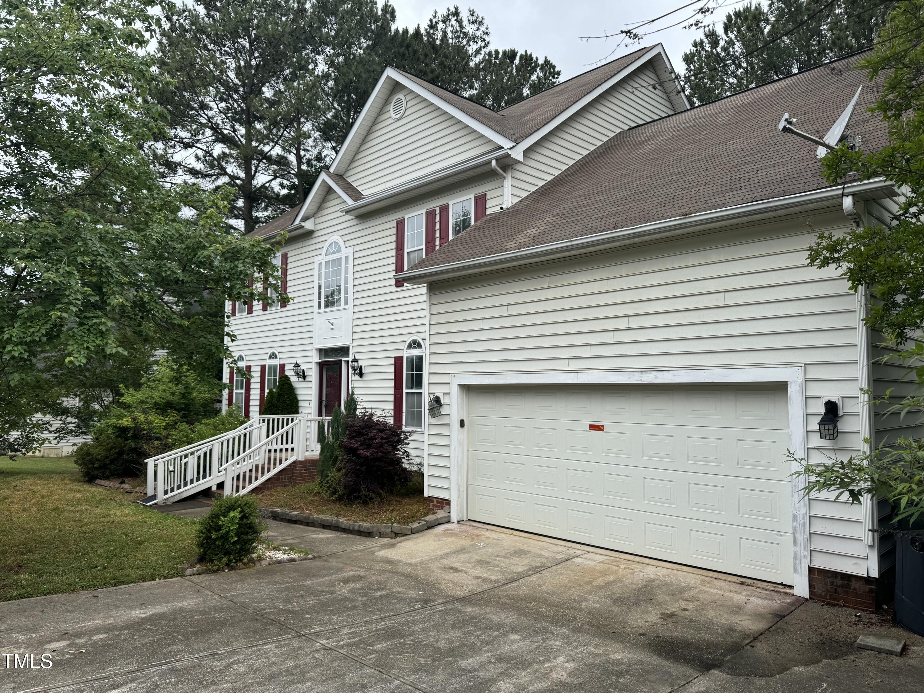 4809 Arbor Chase Drive Raleigh, NC 27616 - Photo 2 of 10 a view of a house with a yard